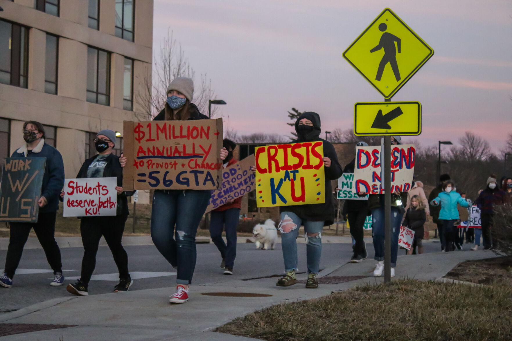 Protestors walking to AFH